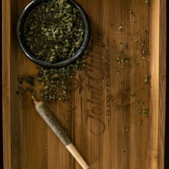 green plant on brown wooden tray